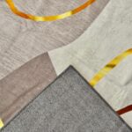 A soft, modern rug in a delicate beige-brown shade