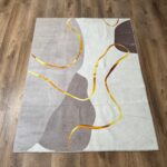 A soft, modern rug in a delicate beige-brown shade