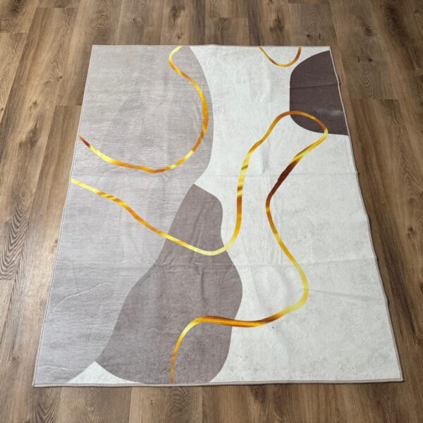 A soft, modern rug in a delicate beige-brown shade