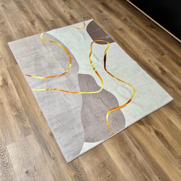 A soft, modern rug in a delicate beige-brown shade