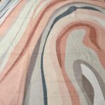 A delicate, modern rug in pastel colors