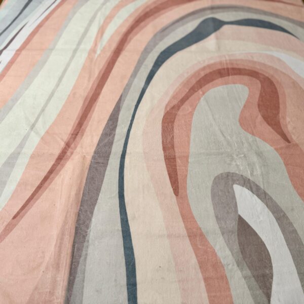 A delicate, modern rug in pastel colors