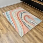 A delicate, modern rug in pastel colors