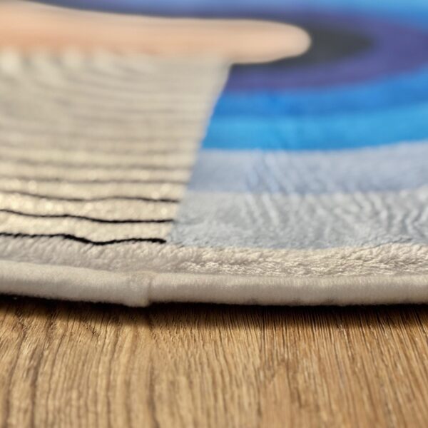Soft blue foam rug in an original shape
