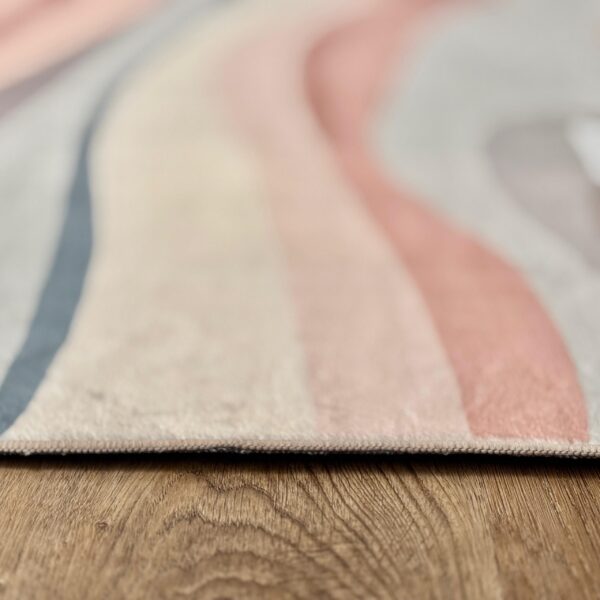 A delicate, modern rug in pastel colors