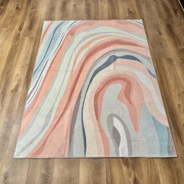 A delicate, modern rug in pastel colors