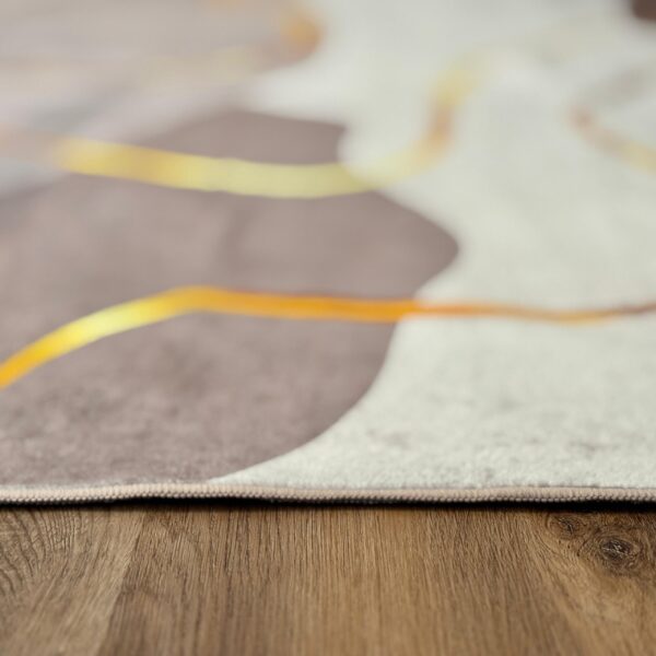 A soft, modern rug in a delicate beige-brown shade